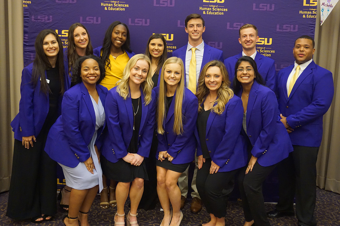 ambassadors in purple blazers