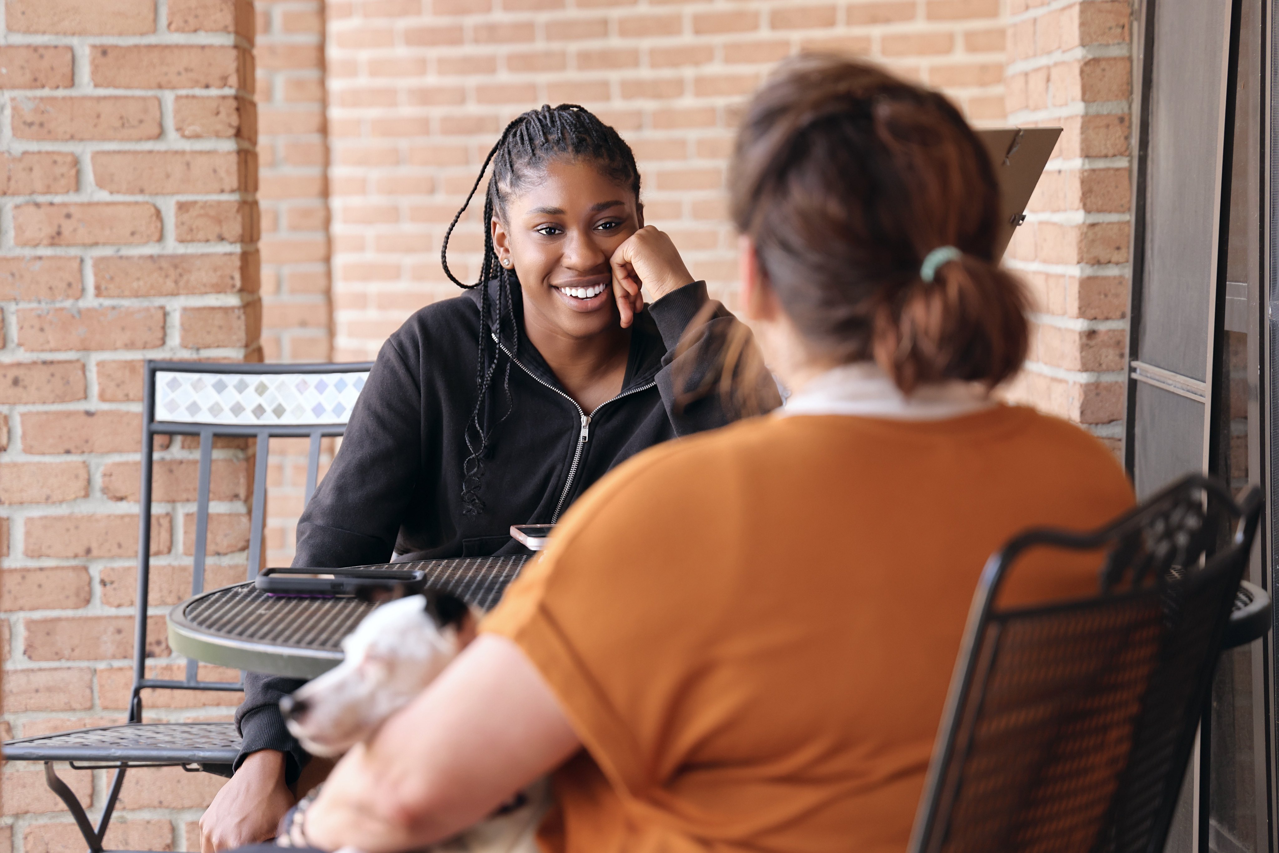 Faculty in Residence with a student outside East Hall