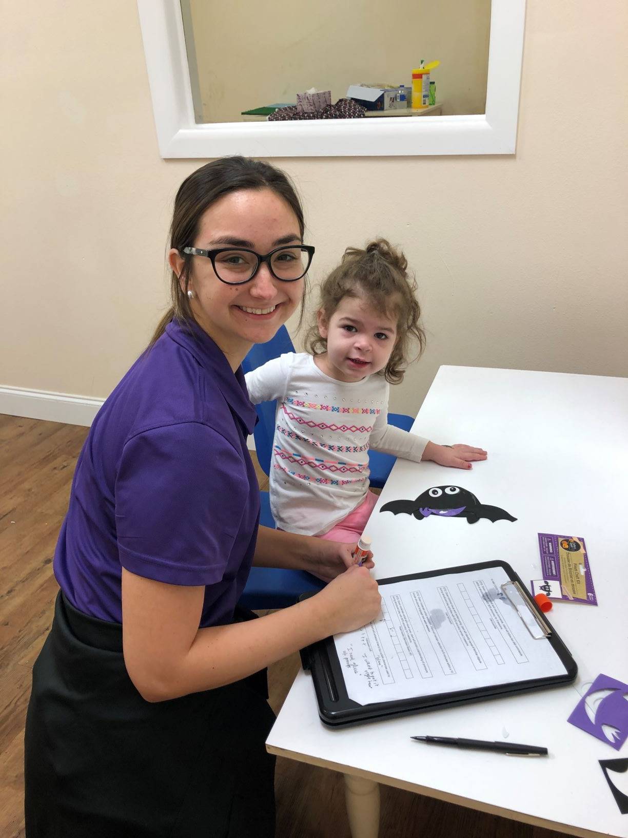 COMD student with a child in program